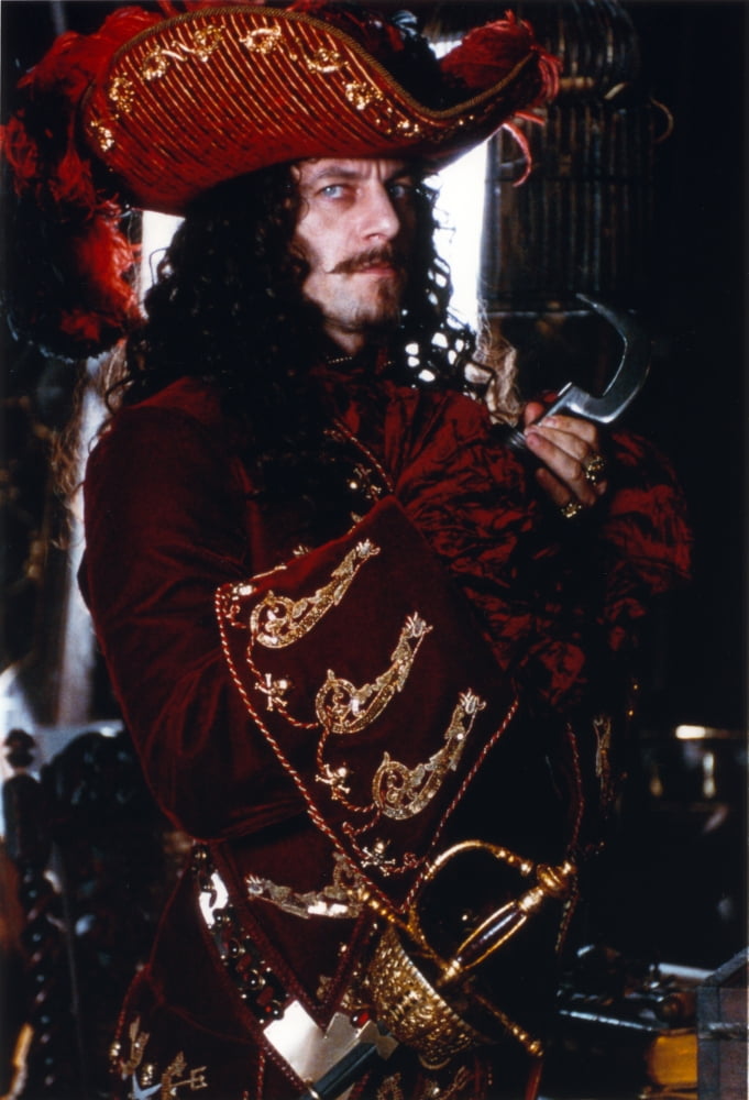 Jason Isaacs in a pirate outfit photo print, available in multiple sizes.