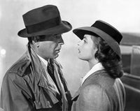 Casablanca movie scene photo print featuring a man and woman in trench coats.