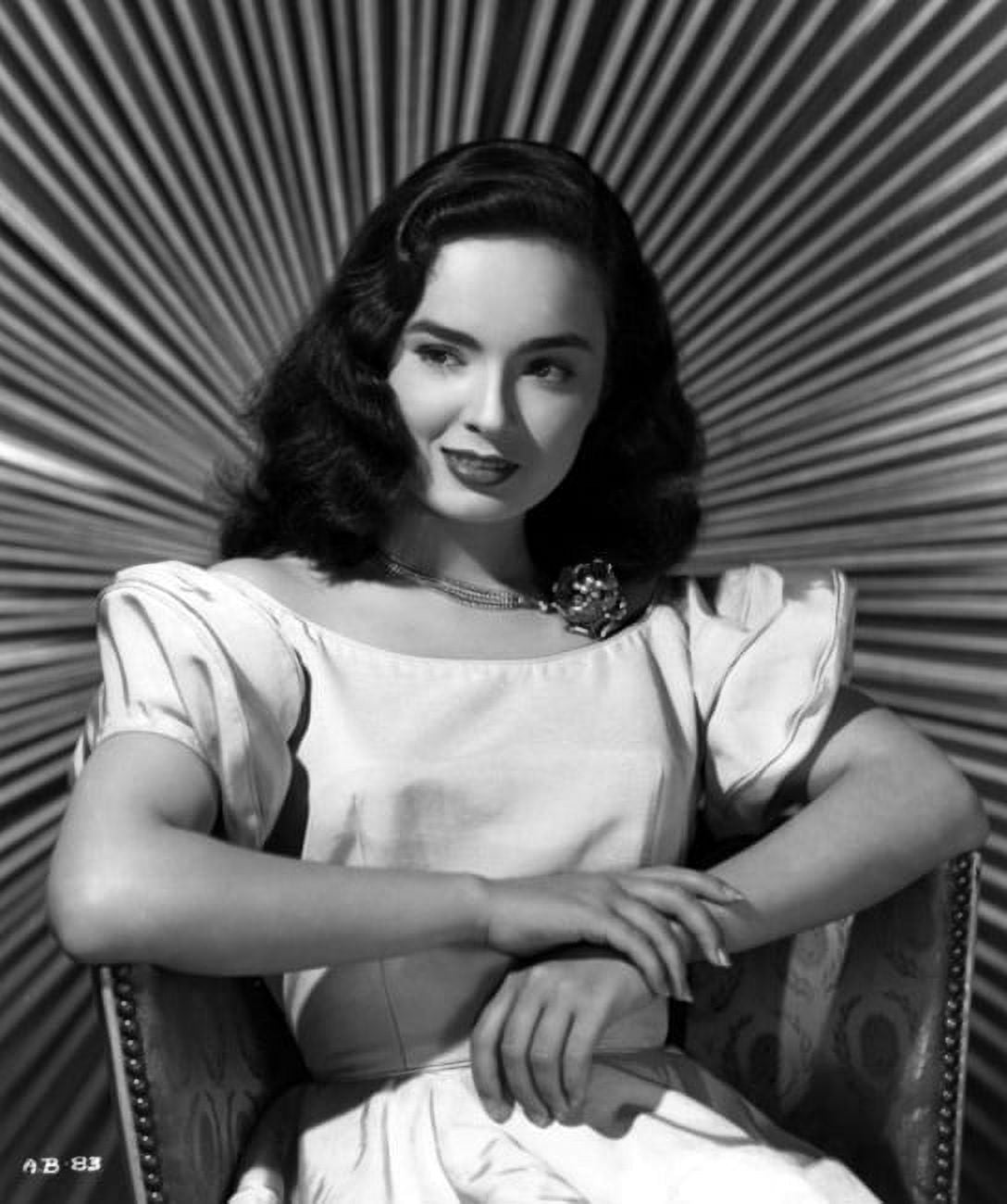 Ann Blyth Sitting Photo Print showcasing vintage charm