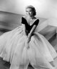 Grace Kelly wearing a black low-cut top and sheer puffy dress photo print.
