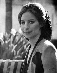 Classic portrait of Barbra Streisand smiling in a photo print.