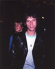 Candid photo print of Jeff Beck in black sport coat and white t-shirt.