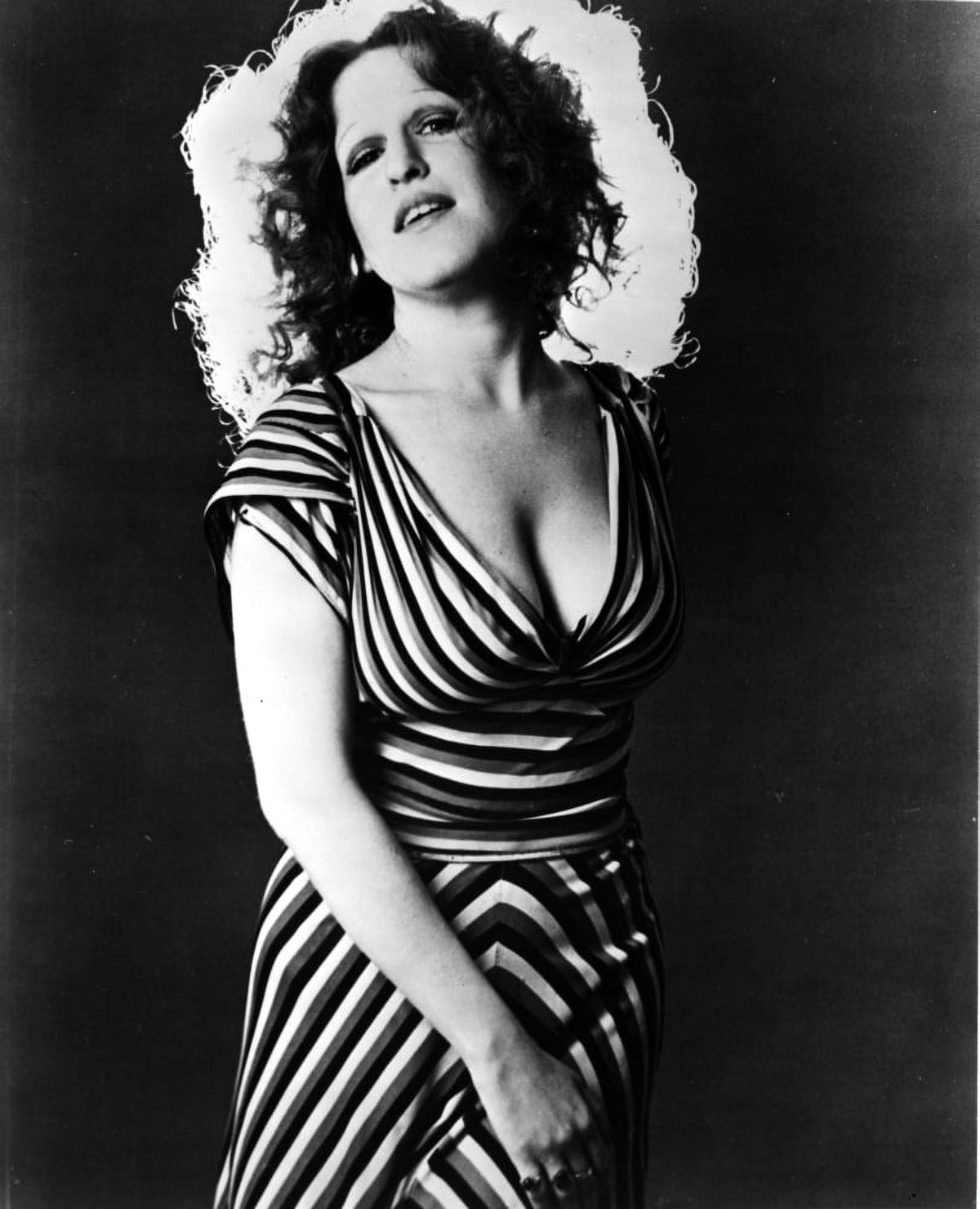 Bette Midler photo print in striped deep V-neck dress showcasing elegance and style.