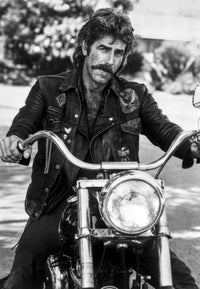 Sam Elliott riding a motorbike photo print in vibrant colors.