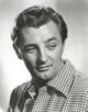 Robert Mitchum classic photo print showcasing his iconic presence.
