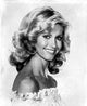 Portrait of Olivia Newton John photo print, vibrant and iconic.