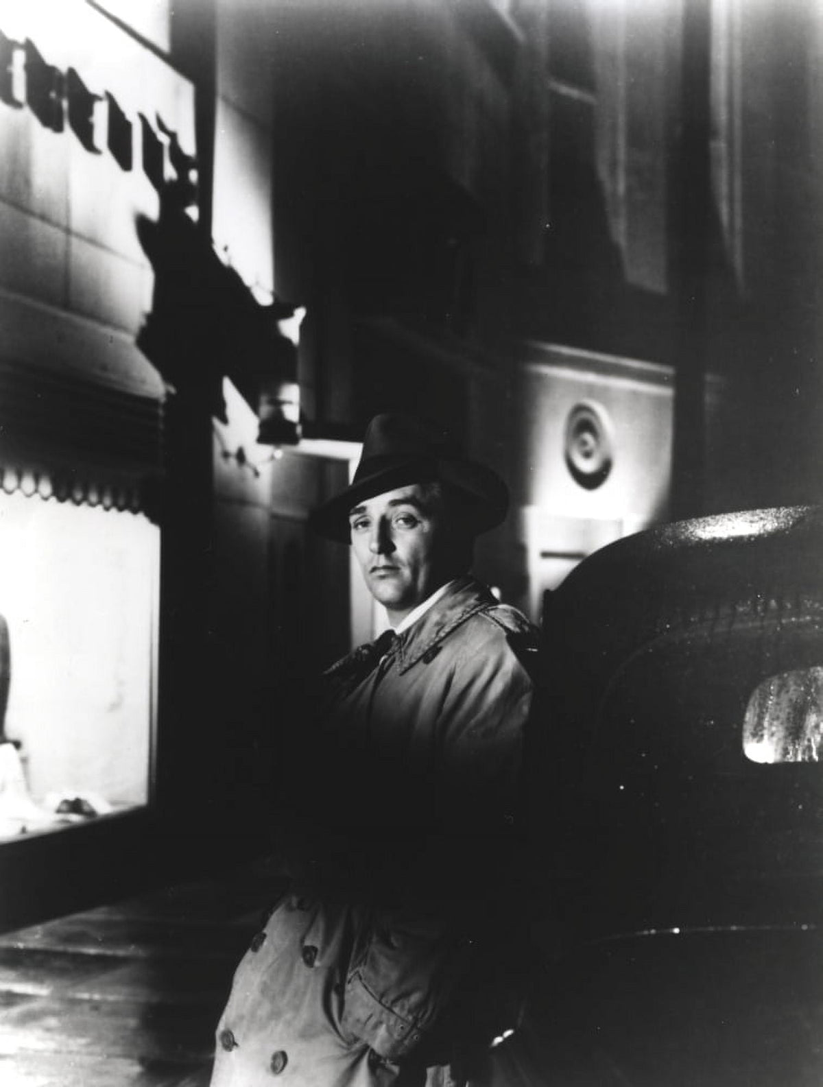 Robert Mitchum leaning on a car classic film still photo print