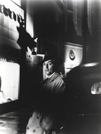 Robert Mitchum leaning on a car classic film still photo print