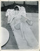 Natalie Wood lounging photo print in vintage Hollywood style.