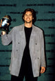 Jim Carrey holding his MTV Movie Award trophy poster print.