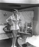 Jane Russell photo print in white silk robe and headband with hands on waist