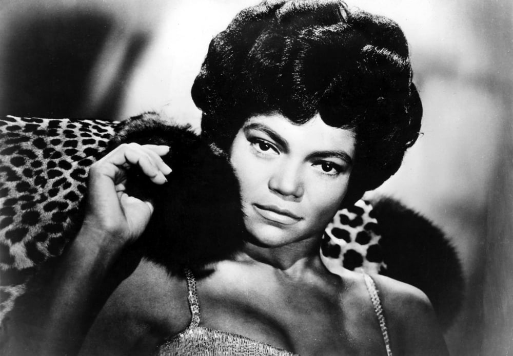 Eartha Kitt photo print featuring leopard print fur