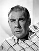 Paul Douglas wearing a stripe polo shirt photo print
