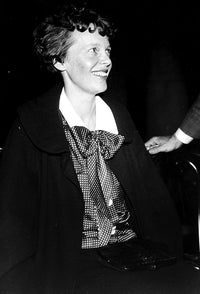 Amelia Earhart smiling photo print showcasing her adventurous spirit.