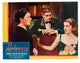 Rebecca movie poster featuring Joan Fontaine and Laurence Olivier, 1940 film classic.