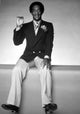 Bill Cosby waving photo print capturing a classic moment