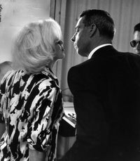Marilyn Monroe and Joe DiMaggio kissing photo print.