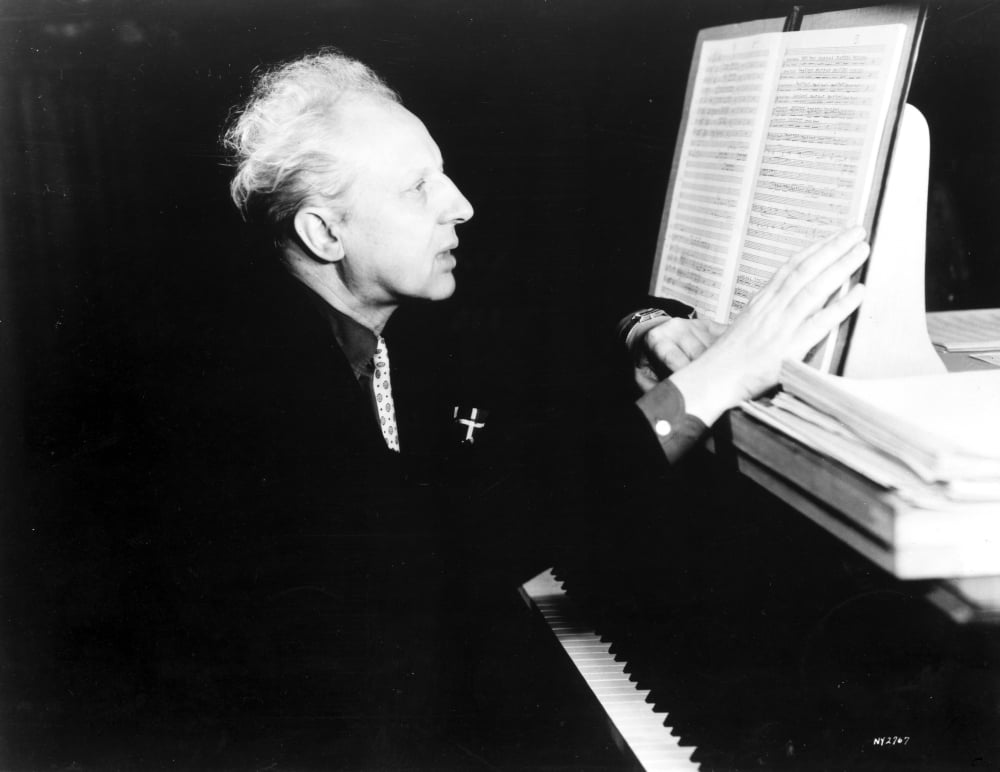 Leopold Stokowski at piano photo print showcasing a legendary conductor.