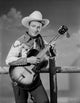 Roy Rogers playing guitar photo print, a classic Americana art piece.
