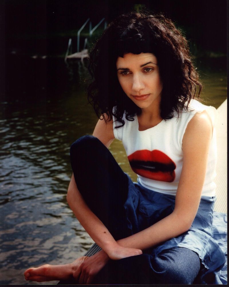 PJ Harvey sitting on a dock photo print - art for music lovers