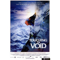 Touching the Void movie poster print displayed on wall