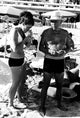 Pablo Picasso and Jacqueline Roque at the beach photo print