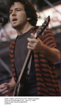 Eddie Vedder live performance photo print capturing energetic concert moment.