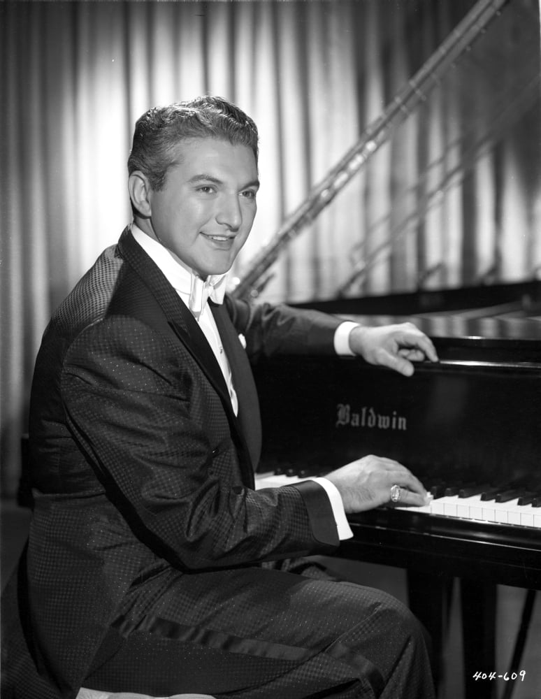 Stunning Liberace photo print showcasing the iconic entertainer in vibrant detail.
