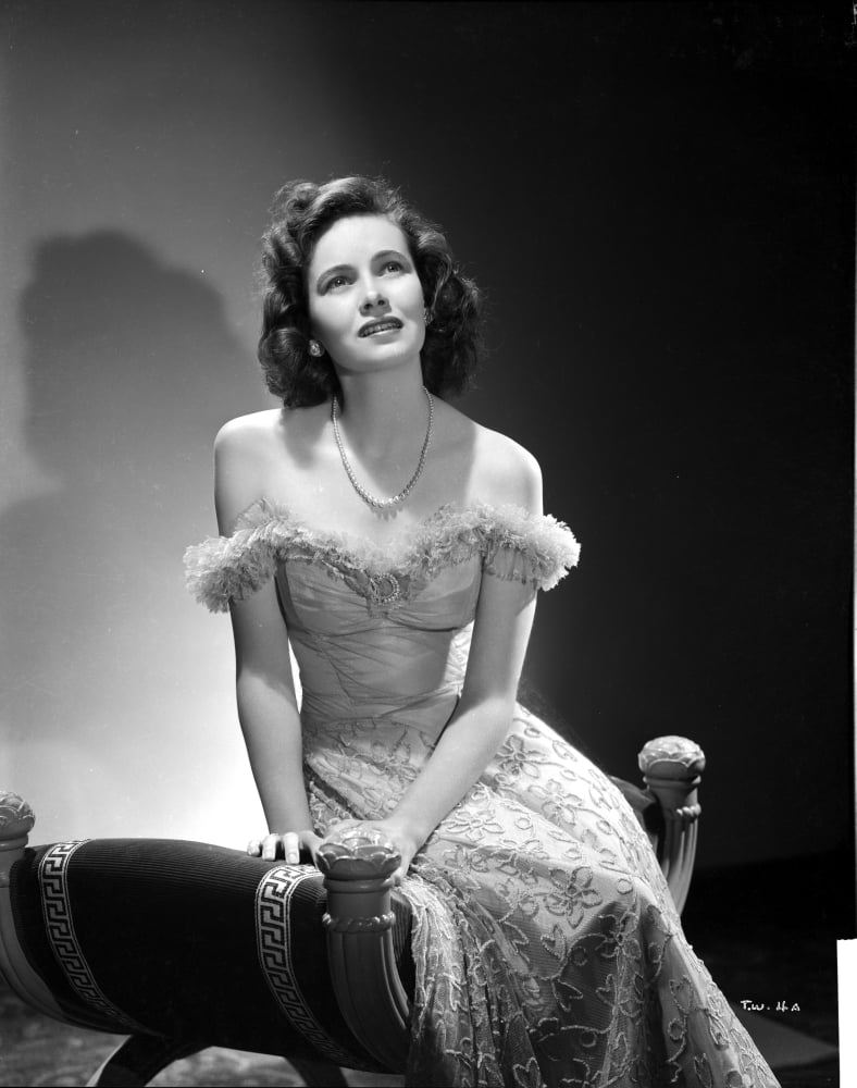 Teresa Wright seated in off shoulder dress vintage photo print.