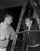 Classic photo print of James Dean and Tab Hunter in 1950s cinema.