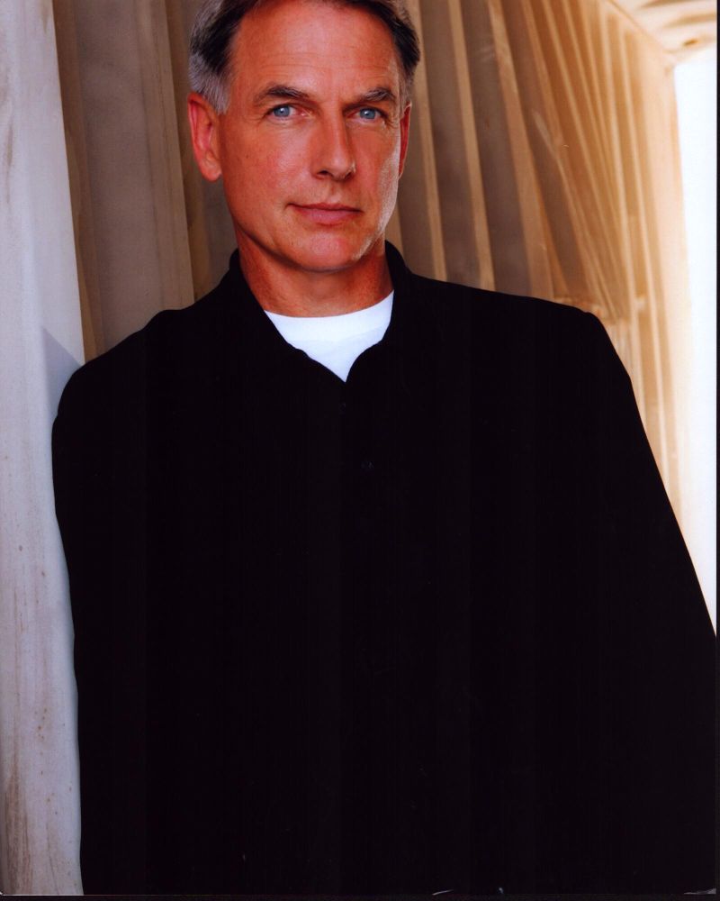 Mark Harmon leaning against a wall in a black shirt photo print.