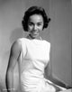 Elegant portrait photo print of Diahann Carroll in a white dress.
