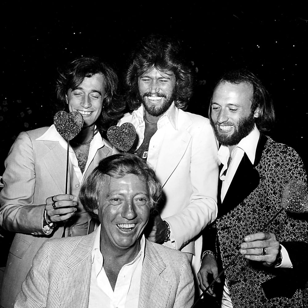 The Bee Gees photo print featuring Robert Stigwood, 8x10 size.