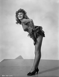 Rita Hayworth bending over in heels vintage photo print