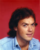 Close-up portrait of Michael Keaton wearing a blue denim jacket photo print.