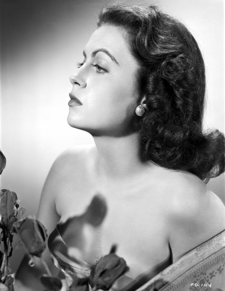 Faith Domergue head and shoulder portrait with pearl earring photo print.