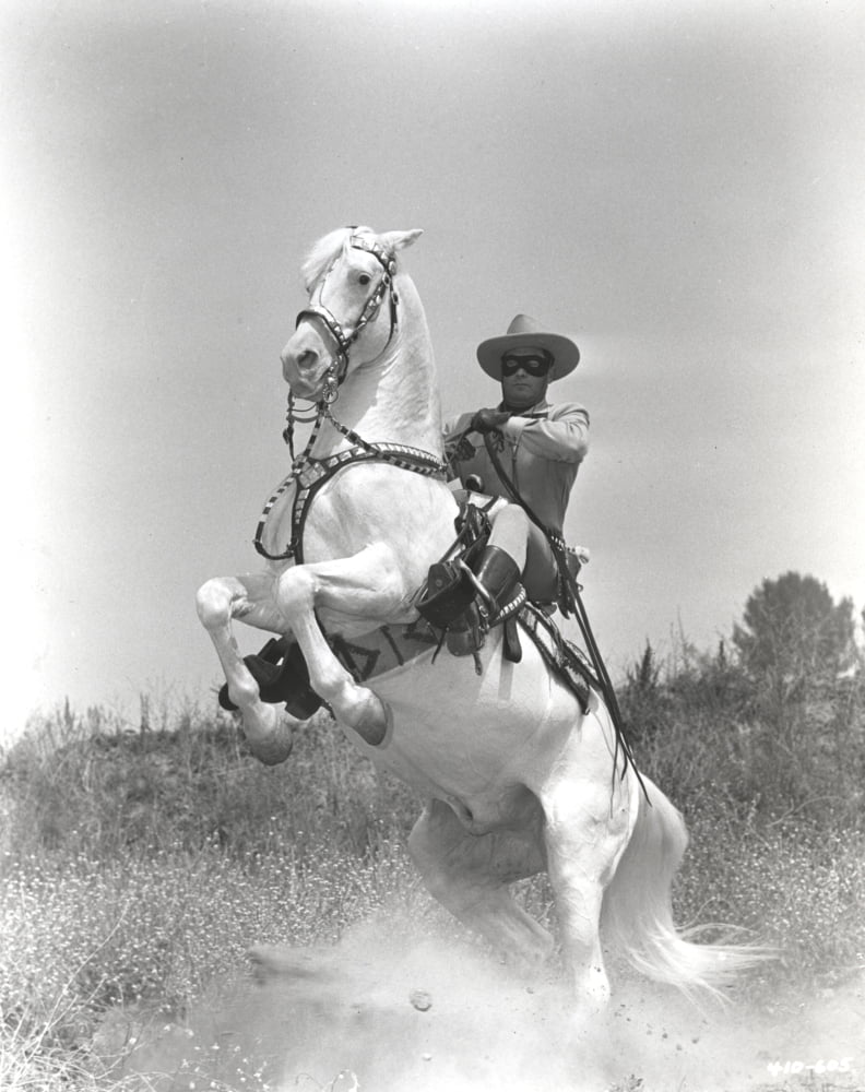 The Lone Ranger film still photo print showcasing a classic movie scene.