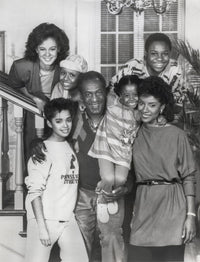 The Cosby Show cast photo print featuring iconic sitcom characters.