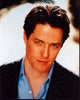 Hugh Grant headshot photo print in striped suit and blue shirt.