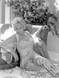 Kim Novak leaning on a sofa classic photo print