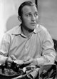 Bing Crosby seated portrait photo print in multiple sizes.