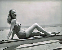 Anne Francis Sitting on Table Photo Print in 8x10, 16x20, 24x30 sizes.