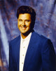 Vince Gill smiling in blue coat photo print