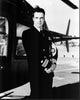 David James Elliott in Uniform Black and White Photo Print next to Helicopter