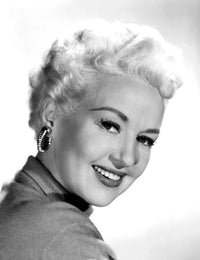 Betty Grable 1954 Photo Print showcasing classic Hollywood glamour.