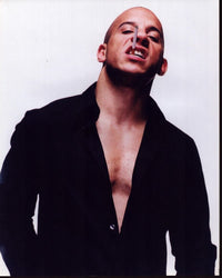 Vin Diesel in unbuttoned black shirt photo print, stylish and captivating.