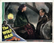The Wolf Man movie poster featuring Maria Ouspenskaya and Claude Rains, classic horror film art.
