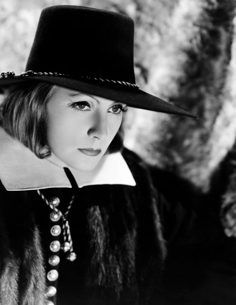 Queen Christina photo print featuring Greta Garbo from the 1933 film, available in multiple sizes.