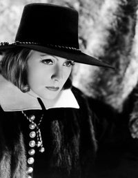 Queen Christina photo print featuring Greta Garbo from the 1933 film, available in multiple sizes.