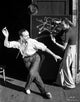 Fred Astaire dancing in a white shirt black and white portrait photo print.